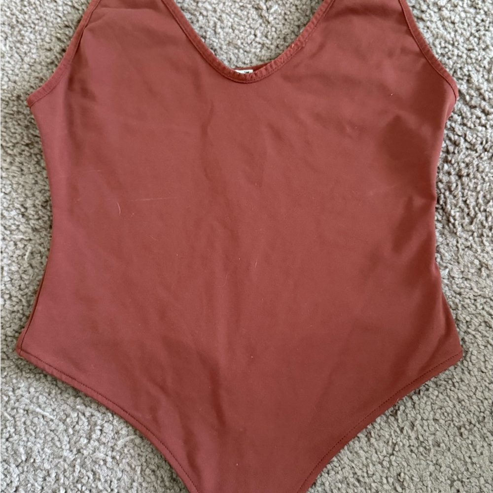 Kids One Piece in Rust by [Brand]